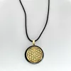 Pendentif fleur de vie dorée fond noir
