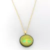 pendentif arbre de vie doré fond vert