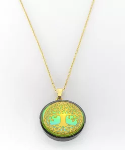 pendentif arbre de vie doré fond vert