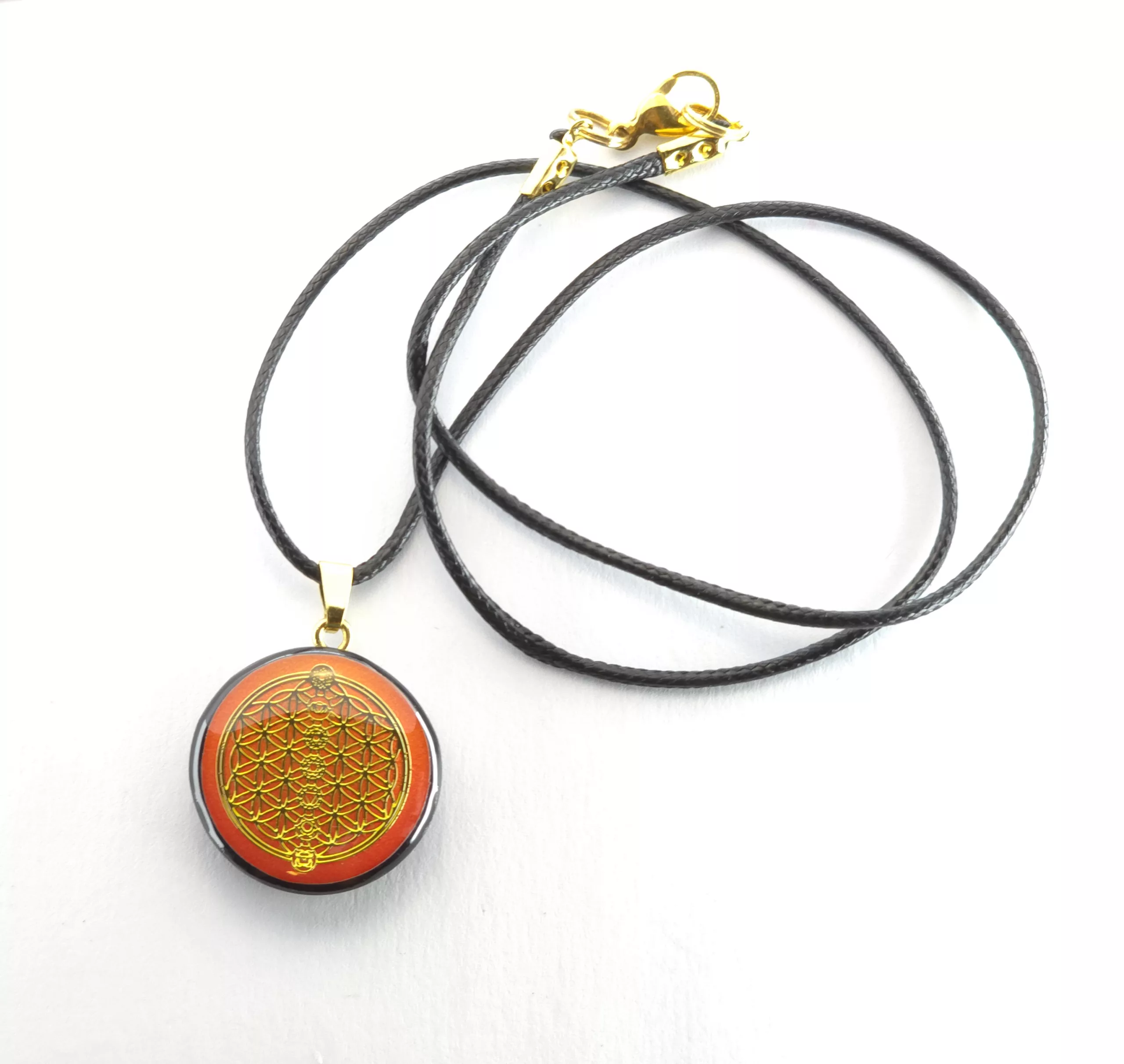 Pendentif fleur de vie fond orangé - shungite