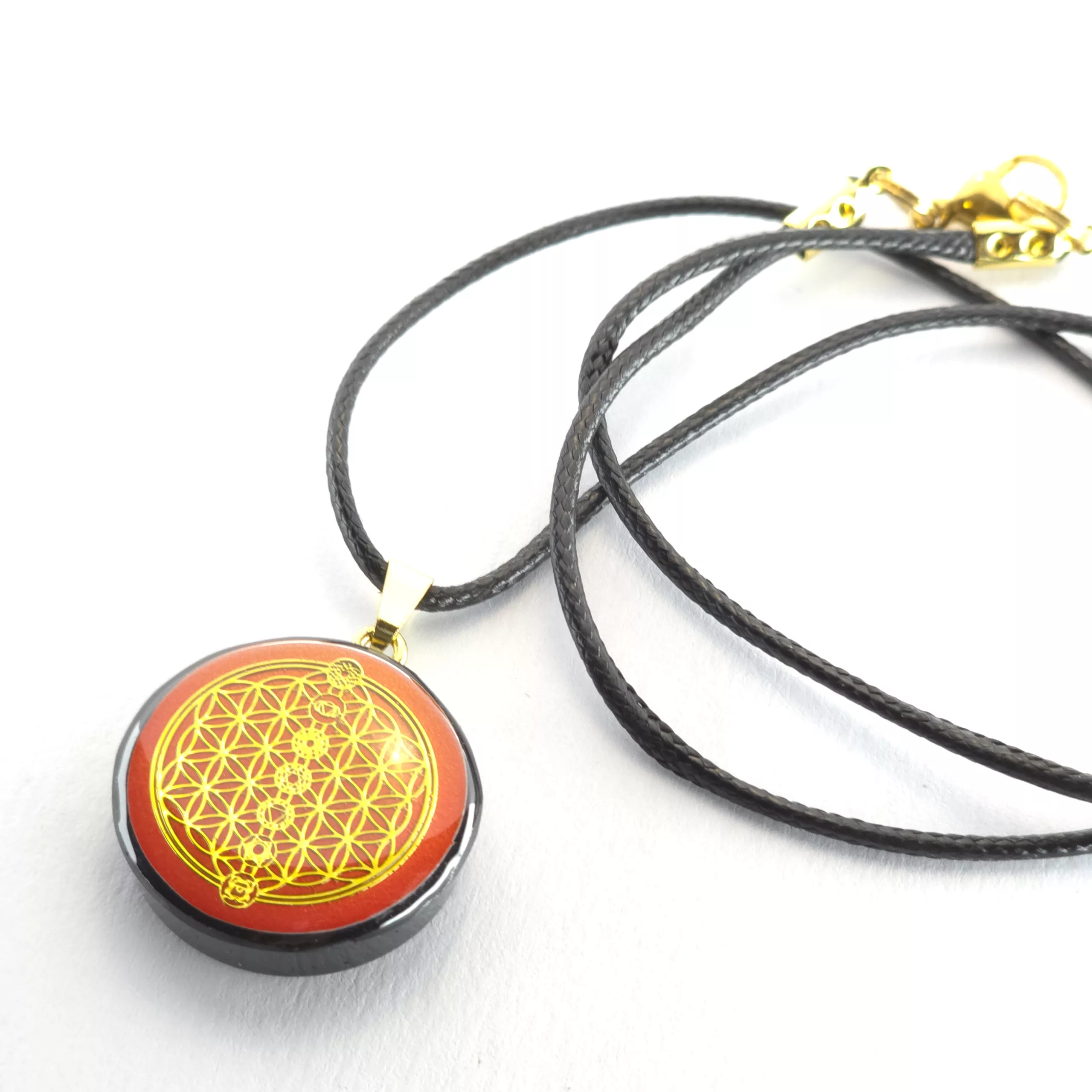 Pendentif fleur de vie fond orangé - shungite