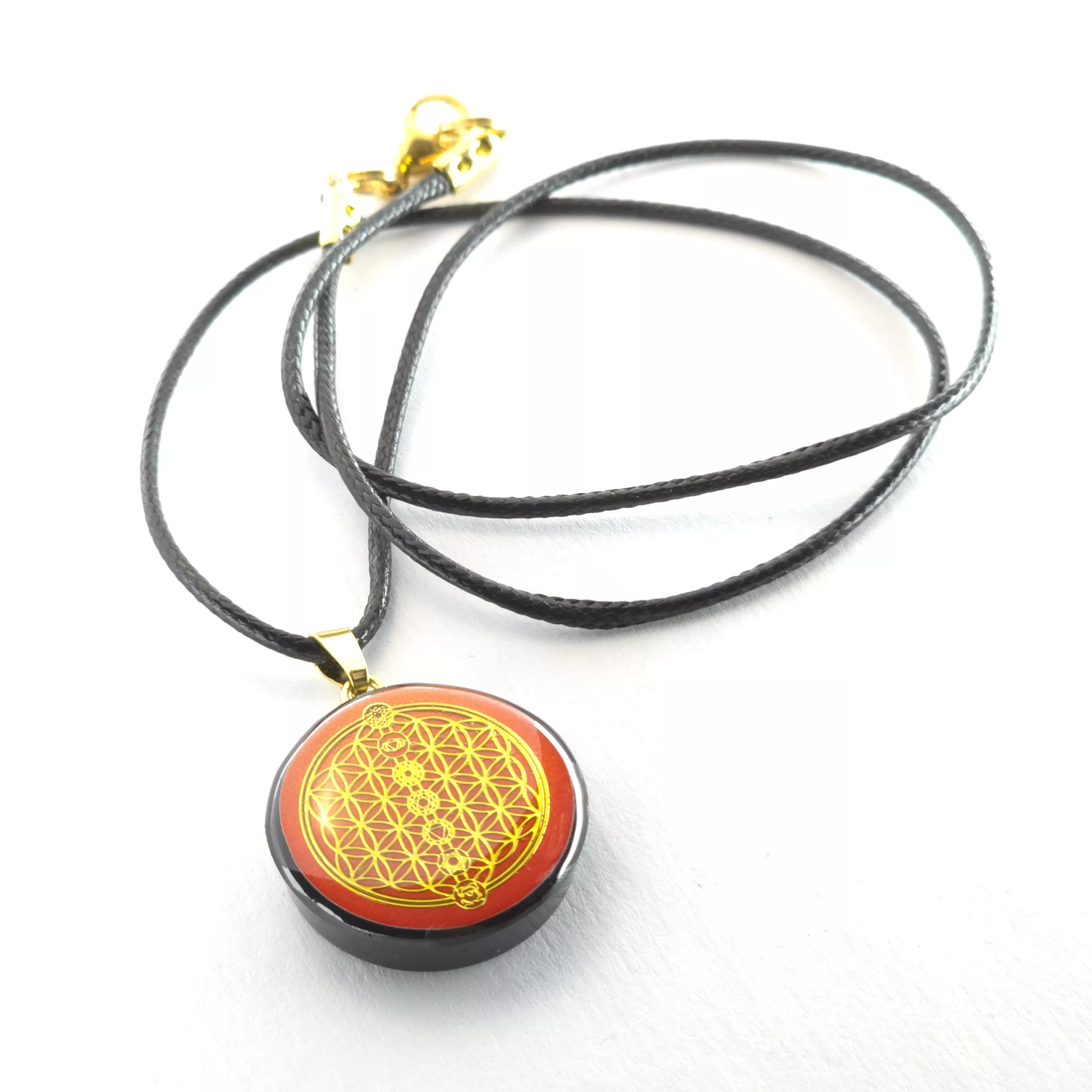 Pendentif fleur de vie fond orangé - shungite