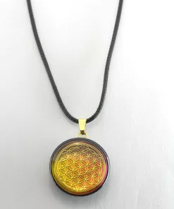 Pendentif artisanal fleur de vie fond coloré
