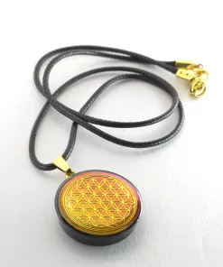 Pendentif artisanal fleur de vie fond coloré